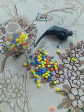 تجریه خرید تیر تفنگ دنیای سرگرمی های کمیاب مدل یدک ساچمه طرح نارنجک بسته 500 عددی