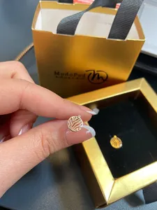 تجریه خرید گوشواره طلا 18 عیار زنانه مدوپد مدل دایره کد GA1-11207