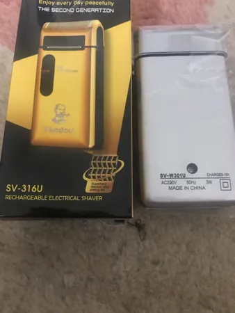 ماشین اصلاح موی صورت یاندو مدل SV-316U به همراه تیغه و توری یدک