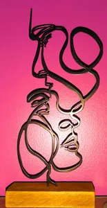 تجریه خرید تندیس نیتا متال طرح دو چهره