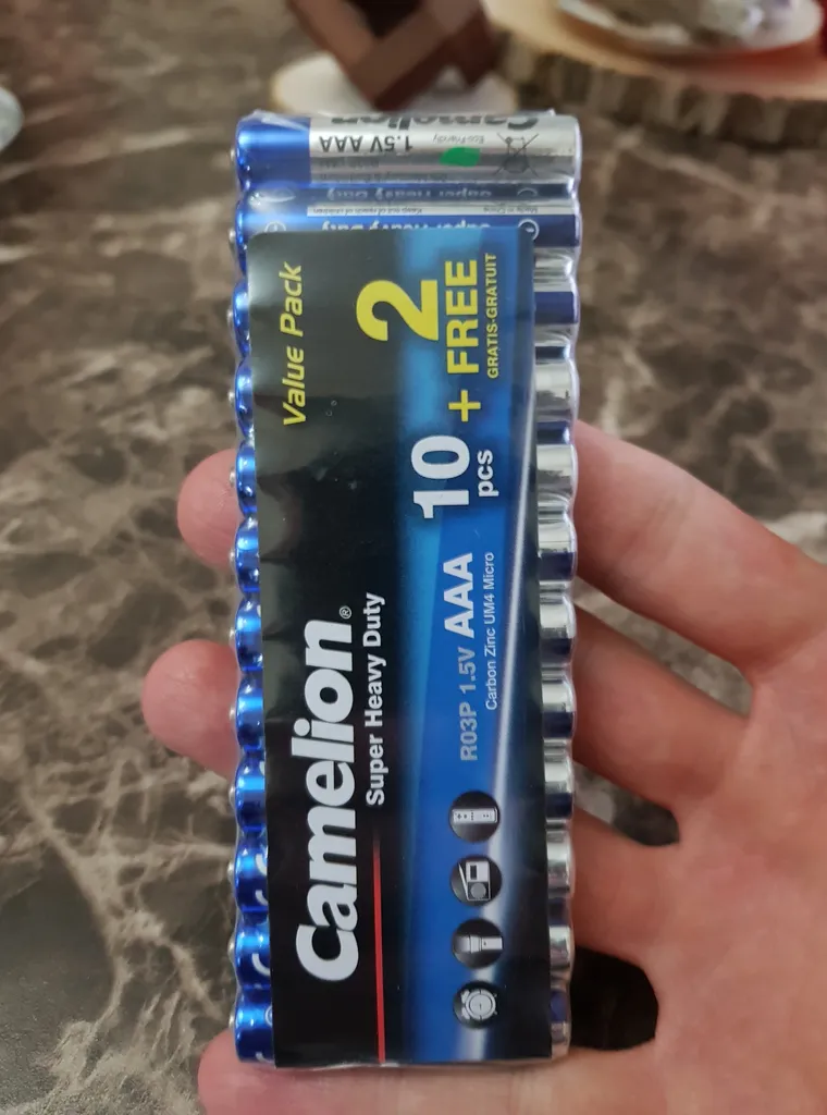 باتری نیم قلمی کملیون مدل Super Heavy Duty بسته 12 عددی