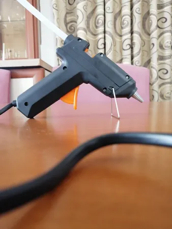 دستگاه چسب تفنگی جانسون مدل FL-138B به همراه یک عدد چسب حرارتی جانسون بصورت رایگان