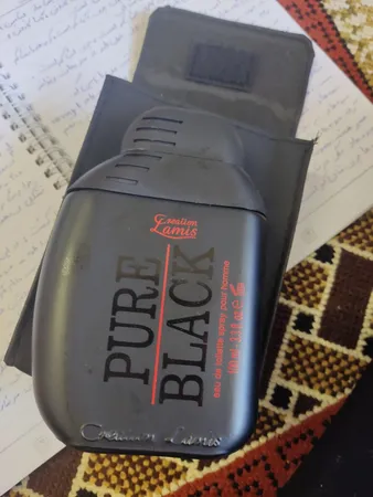 پرفیوم کریشن لامیس مدل پوربلک حجم 100 میلی لیتر