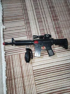 تجریه خرید تفنگ بازی گلدن گان مدل naabsell20