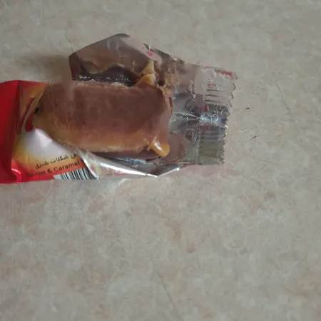 شکلات مغز دار نانی شیرین عسل -800 گرم بسته 100 عددی