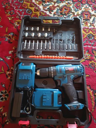 دریل شارژی چکشی باس مدل SK-6050 مجموعه 28 عددی