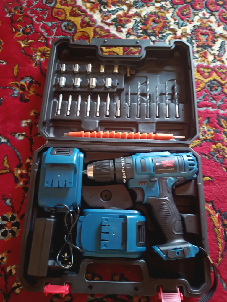 دریل شارژی چکشی باس مدل SK-6050 مجموعه 28 عددی دریل شارژی چکشی باس مدل SK-6050 مجموعه 28 عددی