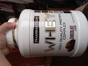 تجریه خرید پودر وی پروتئین با طعمم شکلاتی  فارماتک - 1818 گرم