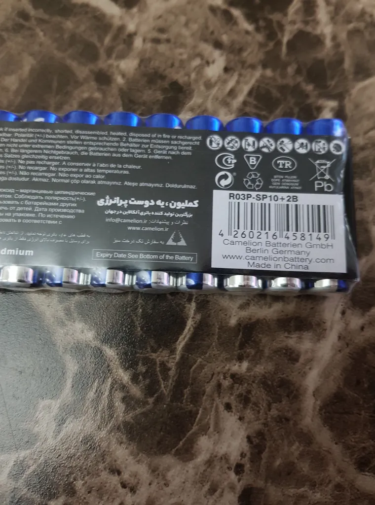 باتری نیم قلمی کملیون مدل Super Heavy Duty بسته 12 عددی