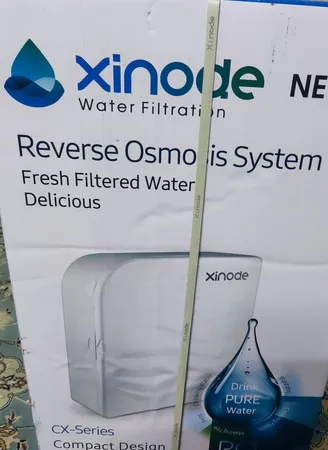 دستگاه تصفیه کننده آب زینود مدل کیسی CX107-W3INLINEF به همراه فیلتر اینلاینی