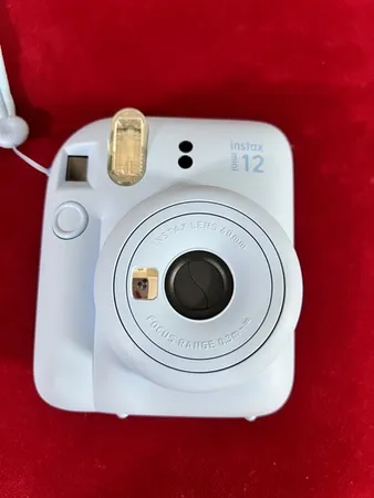 دوربین عکاسی چاپ سریع فوجی فیلم مدل Instax Mini 12