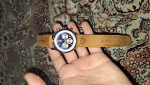 تجریه خرید ساعت مچی عقربه‌ای کوارتز مردانه پوداگار مدل 921 B