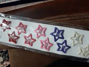 تجریه خرید گیره مو دخترانه مدل تق تقی ستاره ای پاستیلی بسته 10 عددی