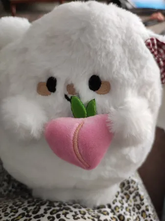 عروسک مدل هلو به دست ارتفاع 25 سانتی متر