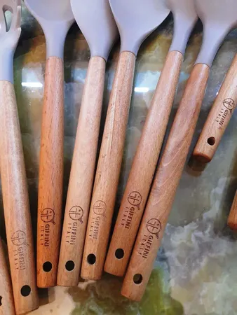 سرویس کفگیر و ملاقه 11 پارچه جی فی نی مدل 02