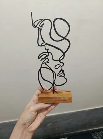 تندیس نیتا متال طرح دو چهره