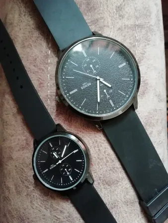 ست ساعت مچی عقربه ای مردانه و زنانه رنوس مدل 1195