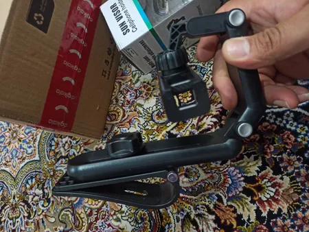 پایه نگهدارنده گوشی موبایل مدل sun visor طرح آفتابگیر خودرو