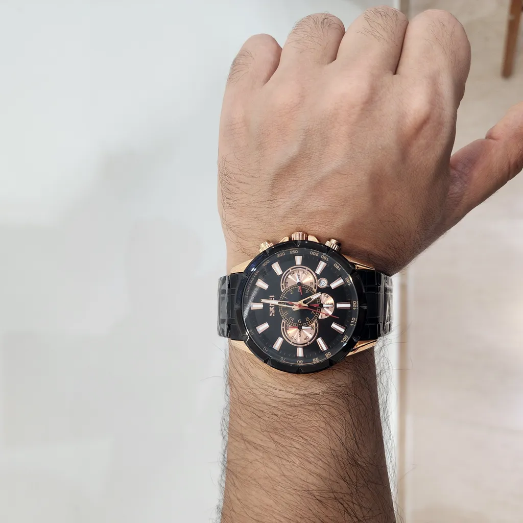 ساعت مچی عقربه ای مردانه اسکمی مدل 9241RG