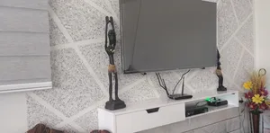 تجریه خرید میز تلویزیون دیواری مدل DLF86L