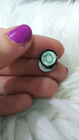 پیرسینگ گوش ناکسیگو مدل شب تاب طرح بیمکس کد PM6572