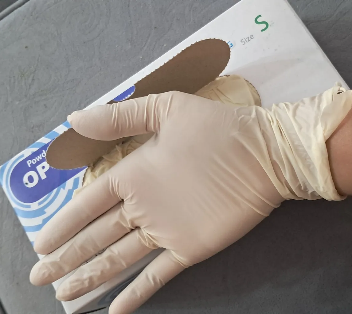 دستکش یکبار مصرف لاتکس حریر مدل OP-PERFECT سایز اسمال بسته 100 عددی