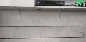 تجریه خرید میز تلویزیون دیواری مدل DLF86L