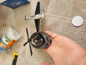 تجریه خرید خوشبو کننده خورشیدی خودرو طرح هواپیما نقره ای ملخی مدل AF1008