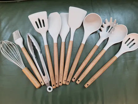 سرویس کفگیر و ملاقه 12 پارچه جی فی نی مدل 01