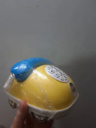 قلک طرح اسباب بازی تلفن و ماشین