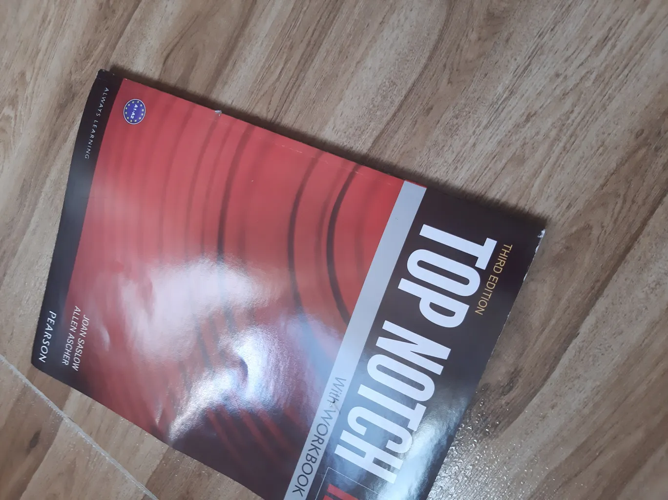 کتاب زبان تاپ ناچ 1B اثر Joan Saslow به همراه لوح فشرده