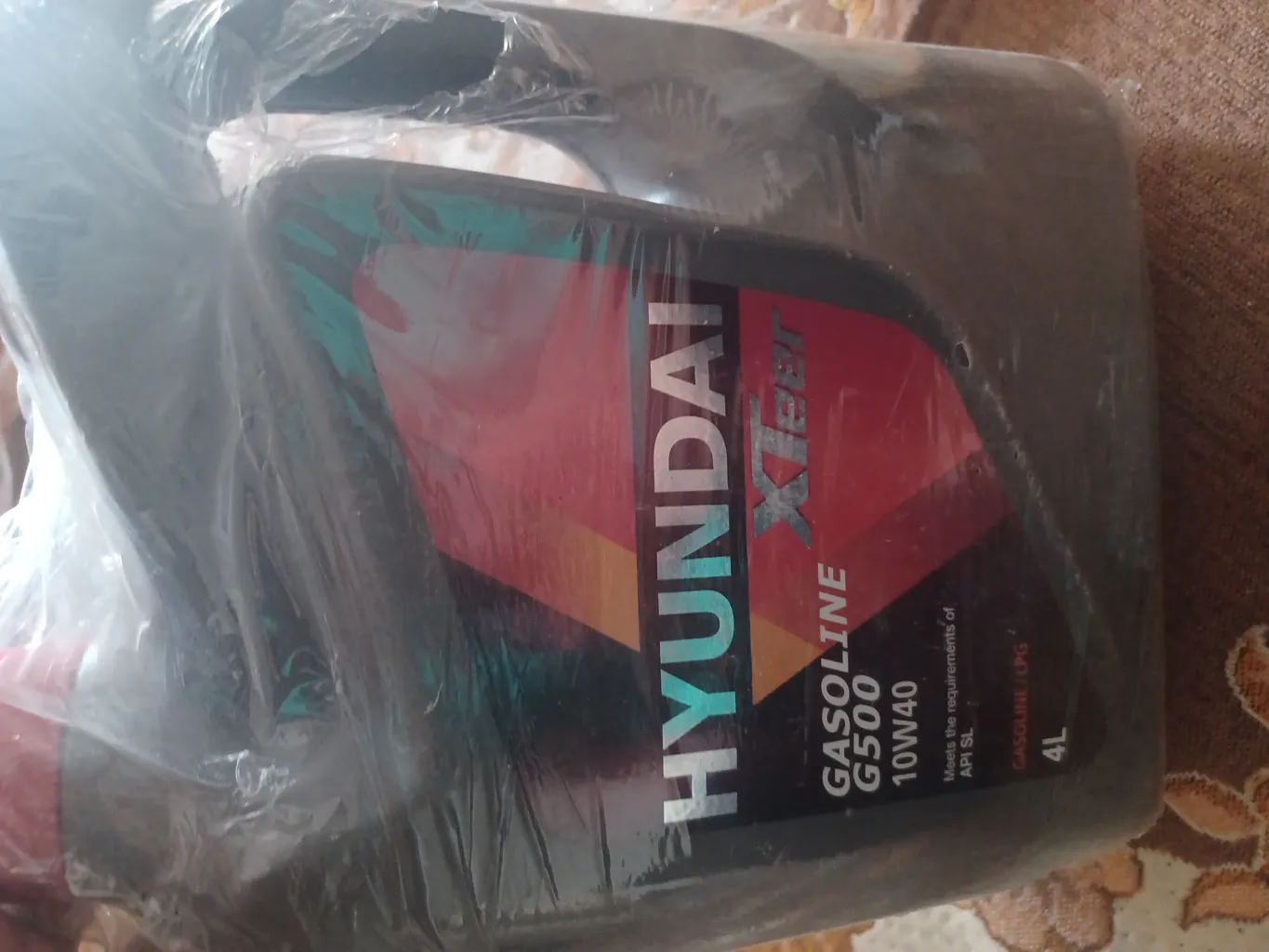 روغن موتور هیوندای اکستیر مدل 10W40 SN حجم 4 لیتر