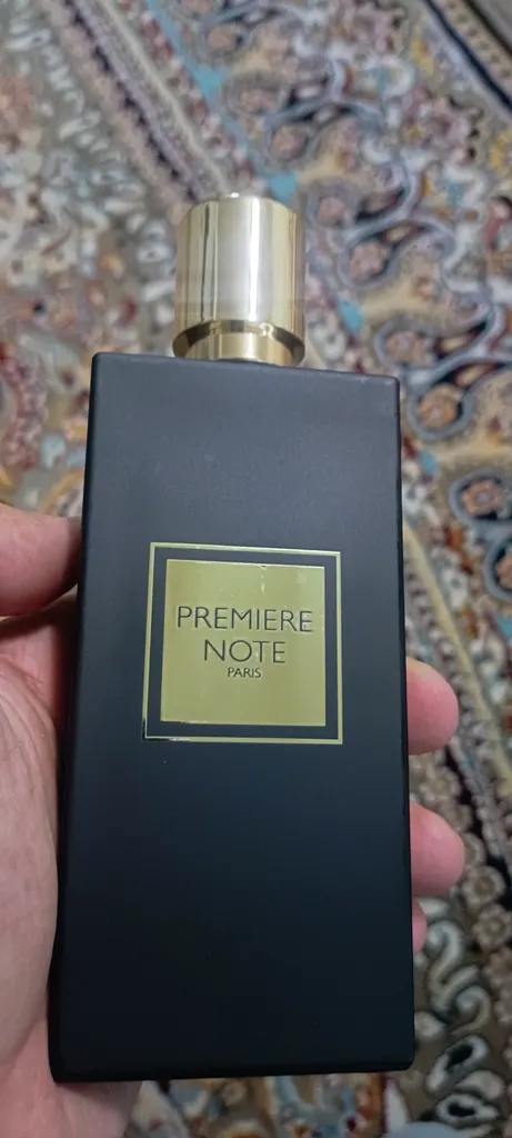 ادوپرفیوم زنانه پریمیر نوت مدل YSL BLACK OPIUM با رایحه گرم حجم 100 میلی‌لیتر