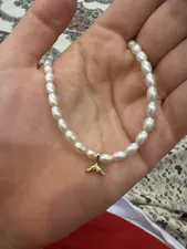 تجریه خرید آویز گردنبند طلا 18 عیار زنانه ناریا طرح دم وال کد SH5