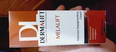 کرم روشن کننده صورت درمالیفت مدل Melalift مناسب انواع پوست حجم 40 میلی لیتر