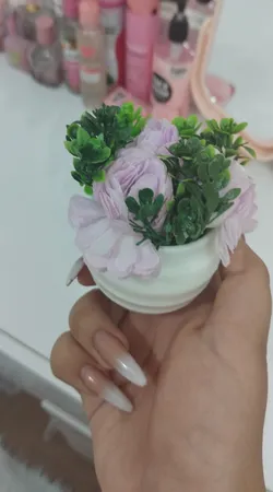 گلدان به همراه گل مصنوعی مدل سه گلی k16