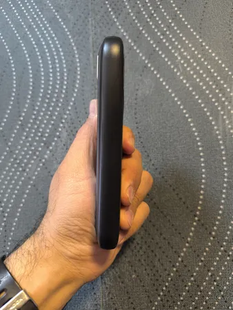 پاوربانک 22.5 وات نیوماین مدل AL28 ظرفیت 10000 میلی آمپر ساعت