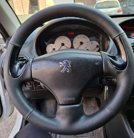 روکش فرمان مدل SP-BL مناسب پژو 206