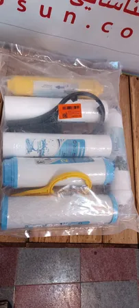 فیلتر دستگاه تصفیه کننده آب آکوا پیورست مدل AP-07 مجموعه 7 عددی به همراه کپسول فاضلاب مدل FLOW 300