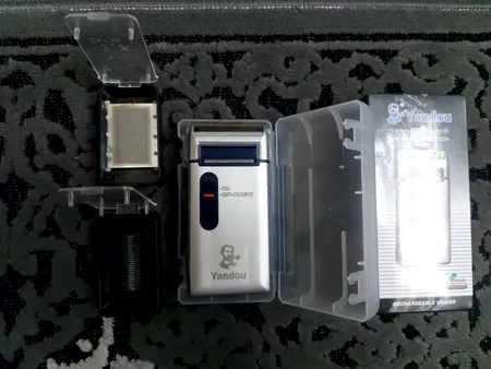 ماشین اصلاح موی صورت یاندو مدل Sv-w301u به همراه تیغه و توری یدک