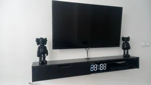 تجریه خرید میز تلویزیون دیواری مدل DLF86L