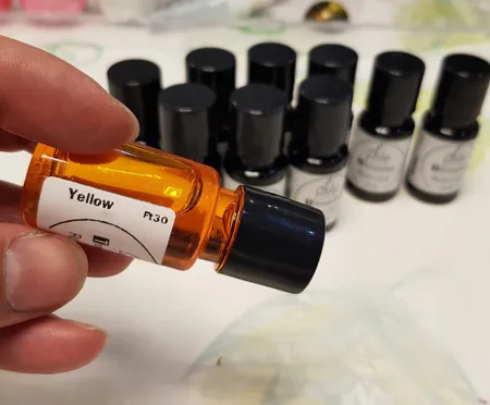 رنگ رزین فیلو مدل transparent بسته 12 عددی حجم 10 میلی لیتر