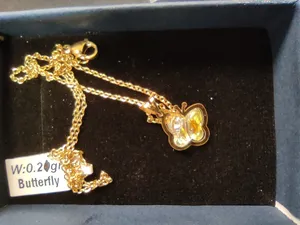 تجریه خرید گردنبند طلا 18 عیار ناریا مدل پروانه رنگ سفید