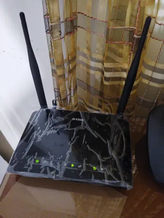 مودم روتر ADSL2 Plus بی‌ سیم N300 دی-لینک مدل DSL-2740U