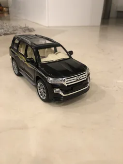 ماشین بازی چه ژی مدل فلزی 6 درب بازشو تویوتا دودزا