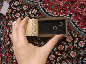 تجریه خرید گوشواره طلا 18 عیار زنانه مدل گردون