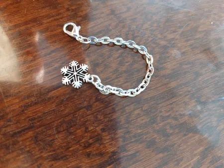 آویز ساعت مارکت لند طرح دانه برف کد 31