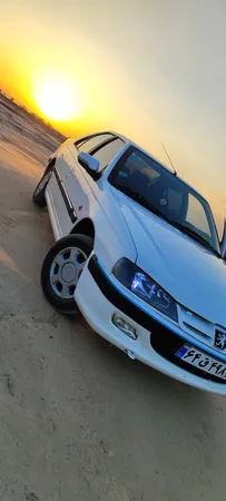 چراغ جلو دودی اسپرت خودرو فن آوران پرتو الوند مدل YM110 مناسب برای پژو پارس بسته دوعددی