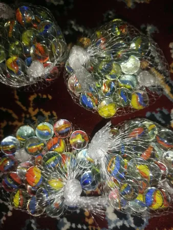 تیله شیشه ای مداد چوبی مدل چند پر بسته 100 عددی