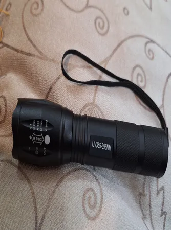 چراغ قوه دستی مدل  UV 30000W_ER